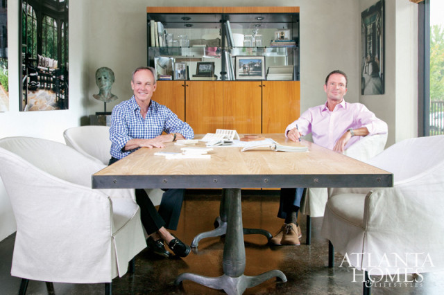 Photography by Christina Wedge. A conference table, custom-made by Kevin Scanlon, is one of the few new pieces. Its double cast-iron pedestal drafting bases and bleached-oak top with metal strapping ensure the space is anything but an ordinary conference room. Spitzmiller, left, and Norris.