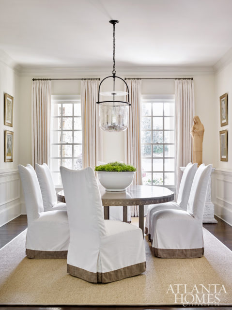 Custom slipcovered chairs and an expanding dining table from Bungalow Classic lend themselves to gatherings during holidays or special occasions.