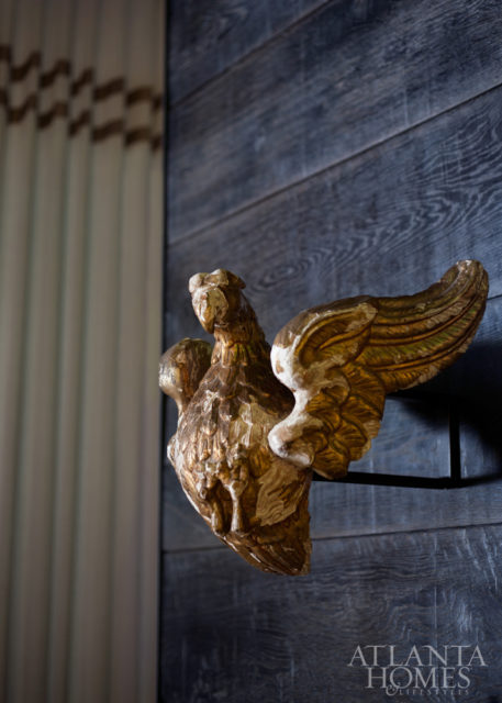 An entry foyer detail; planked wall by Olde Savannah Flooring.
