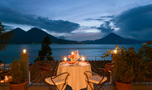 Guests dine with a view on the hotel’s spacious veranda