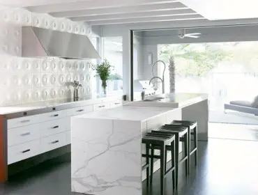 Kitchen with white marble countertops