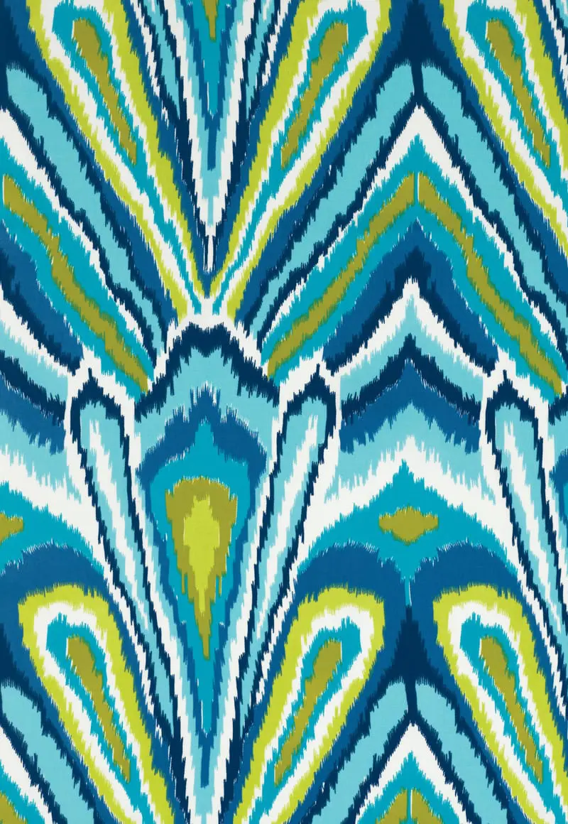 Abstract ikat pattern in shades of navy blue, teal, light blue, lime green, and white with a textured, brushstroke effect.