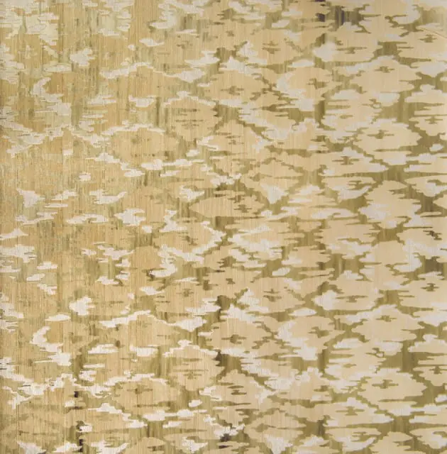 Close-up of a textured fabric with a repeating abstract pattern in shades of beige, cream, and olive green.