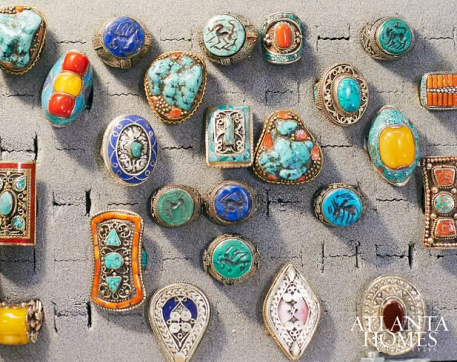 Collection of antique rings with turquoise, lapis lazuli, coral, and amber stones set in silver