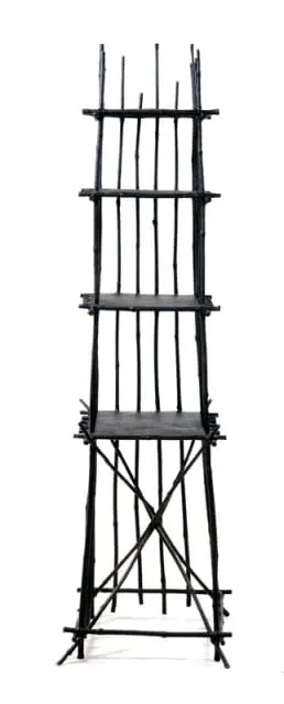 Tall, dark, and narrow shelving unit constructed from thin, uneven branches arranged vertically and horizontally, with three visible shelves.