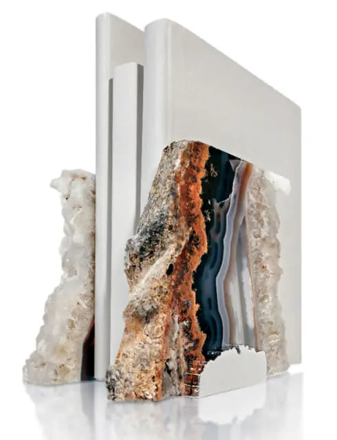 White bookends with rough, layered agate and crystal formations in earthy tones and deep blues.