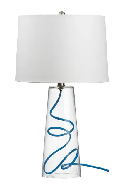 Clear glass table lamp with a conical base featuring a coiled blue cord inside, topped with a white drum shade.