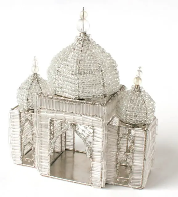 Clear glass beads and silver wire form a miniature Taj Mahal replica with domes and arched doorways.