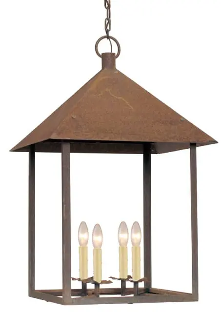 Rustic metal lantern-style pendant light with a peaked roof and four candle-style bulbs