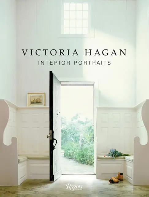 Victoria Hagan Interior Portraits book cover with a white entryway featuring built-in benches and an open door leading to a garden.