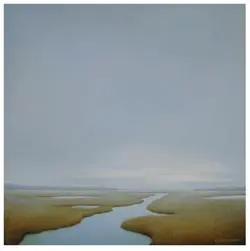 A calm, wide river flows through a marshy landscape under a hazy, overcast sky. The marsh grass is golden brown, and the water is a muted blue.