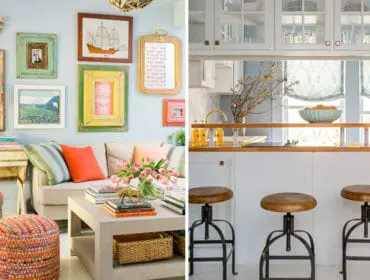 Living room with eclectic gallery wall and neutral sofa, adjacent to a white kitchen island with wooden stools and glass-front cabinets.