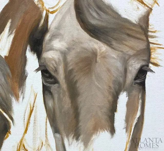 Close-up oil painting of a horse's face with brown and grey tones, showing its eye and mane. "Atlanta Homes & Lifestyles" logo in the bottom right corner.