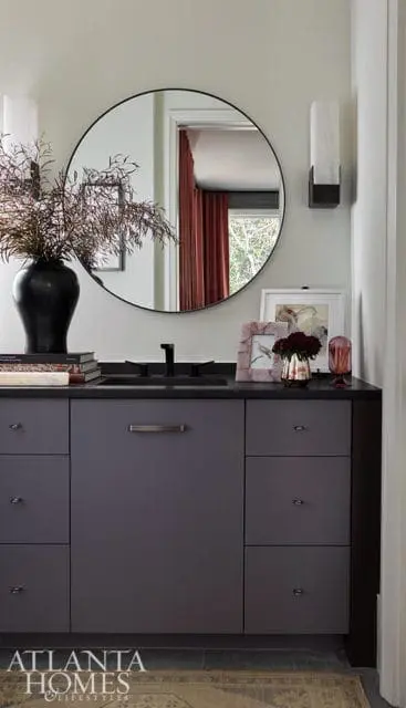 round mirror dark vanity