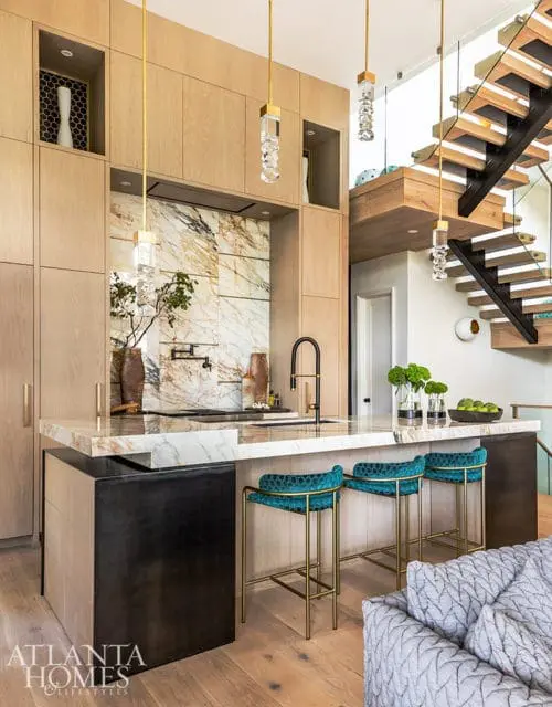 open modern kitchen with oak cabinets