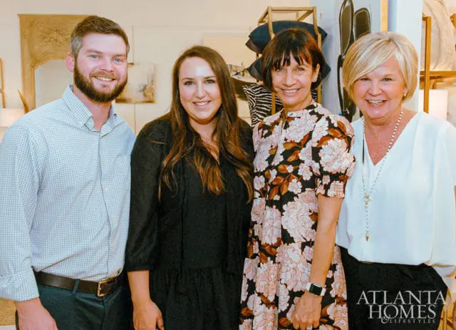 Four people smiling, with Atlanta Homes & Lifestyles logo in the corner.