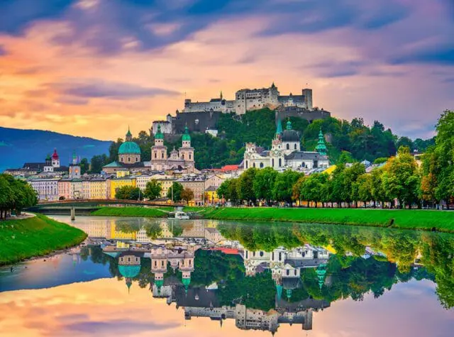 Salzburg, Austria skyline with Hohensalzburg Fortress overlooking the city and Salzach River.