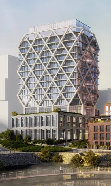 Rendering of a modern building with a diamond-patterned facade and glass windows, surrounded by greenery and a river with a pedestrian bridge.