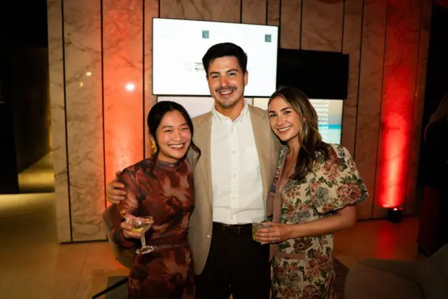 Jerry Pair, Amy Huang, and Carson Lee smiling at an event.