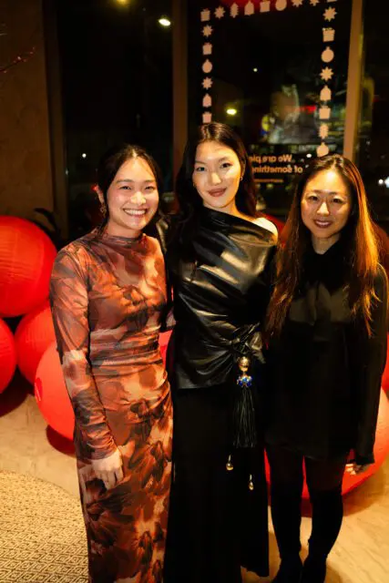 Amy Huang, Joanne Choi, and Jin Young smiling.