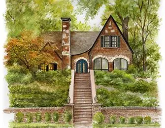 Brick Tudor home with arched windows and a steep roof, surrounded by lush greenery and trees.