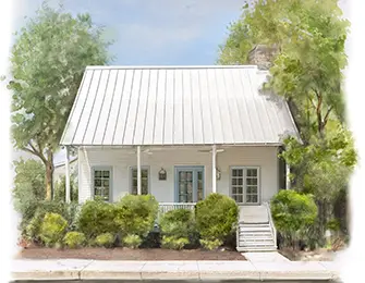 White cottage with blue doors, metal roof, and porch surrounded by lush greenery.