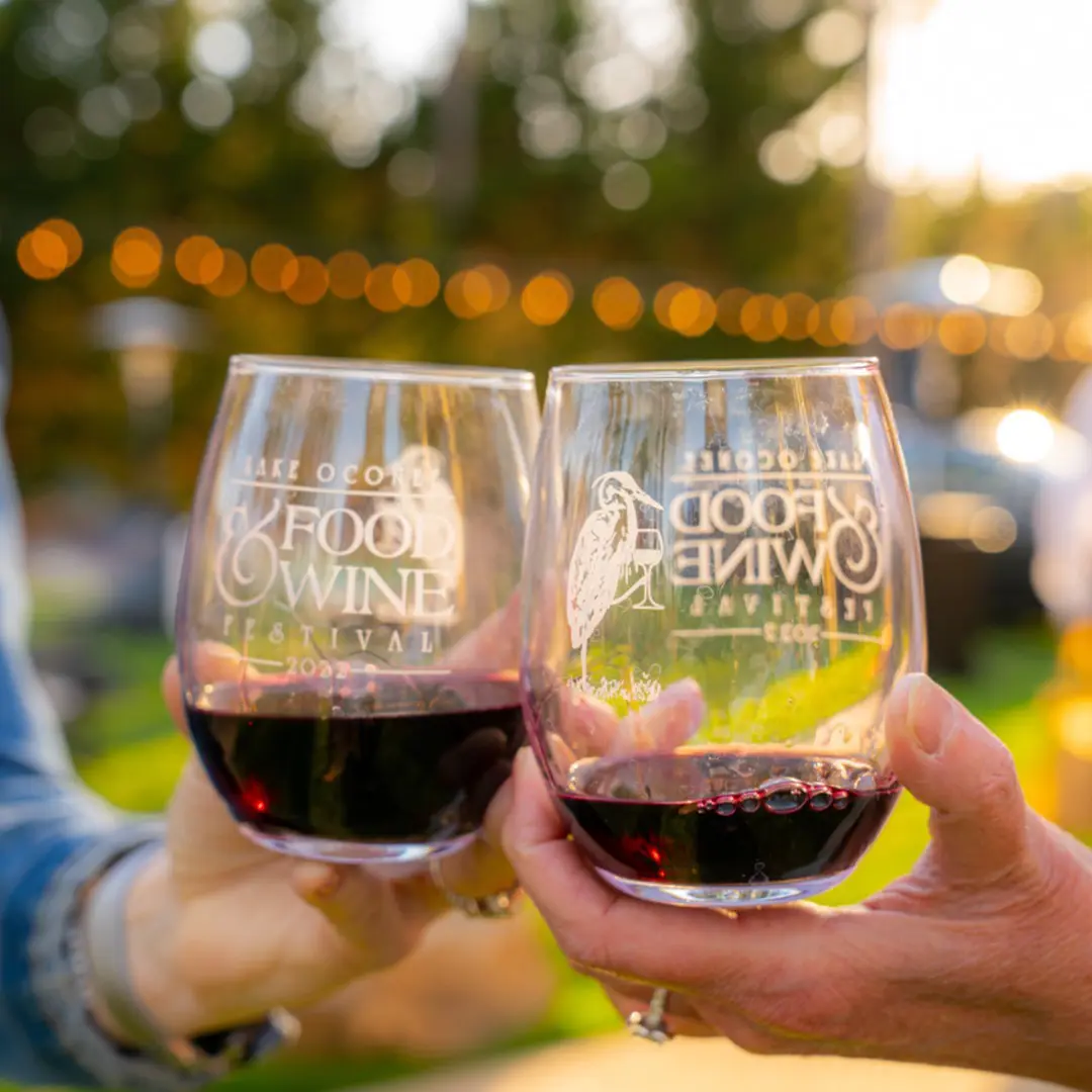 Two wine glasses with 'Lake Oconee Food & Wine Festival 2022' logo