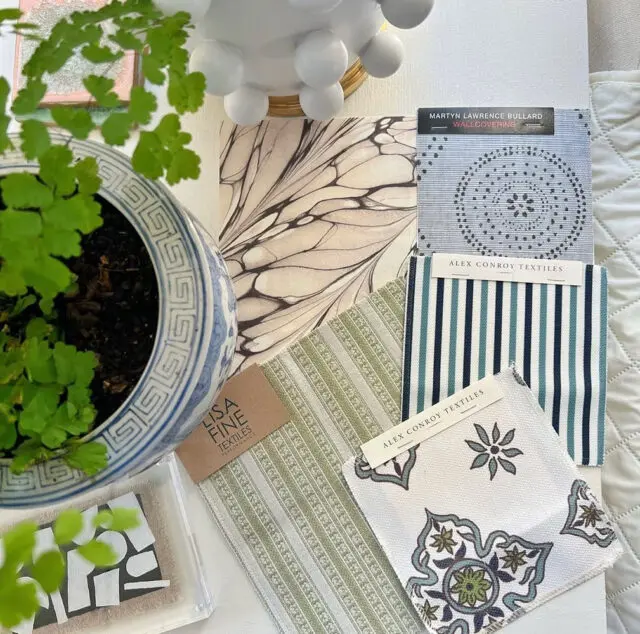 Fabric swatches with stripes, floral patterns, and marbling.