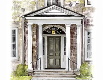 Stone house with white columns framing a dark green paneled door and a hanging lantern.
