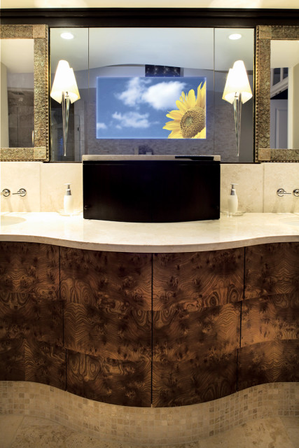 Bathroom vanity with burl wood cabinetry, marble countertop, and a mirrored cabinet displaying a sunflower against a blue sky
