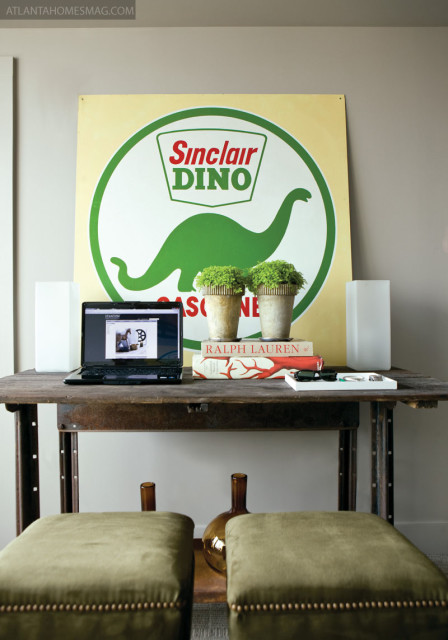 The condominium“s den earned the curious addition of a Sinclair Dino sign.