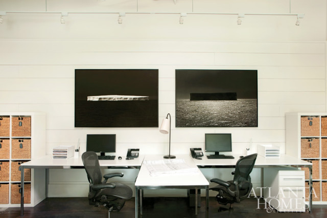 Two eye-catching, black-and-white photographs by Todd Murphy take center stage on a wall in the design studio.