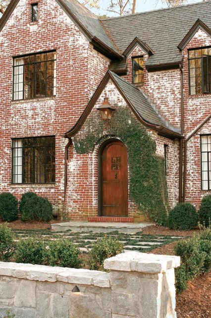 Douglass was immediately attracted to what she refers to as this Tudor’s crunchy exterior. Part of its beauty is that its not perfect,” she says. Someone painted it in the past and didn’t want to clean up. To her, it’s all part of the charm.