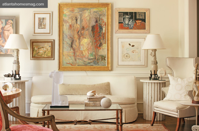 The living room is a vision in white, from the armless sofa and Dessin Fournir chair to a pair of tables topped with lamps with bases that are some 200 years old. The neutral setting allows the focus to remain on the art, including works by Isabelle Melchior, Norman Lewis, Jennifer Cauley and Chris Bilton. Dessin Fournir chair, Jerry Pair. Lamps, Carter Hipp.