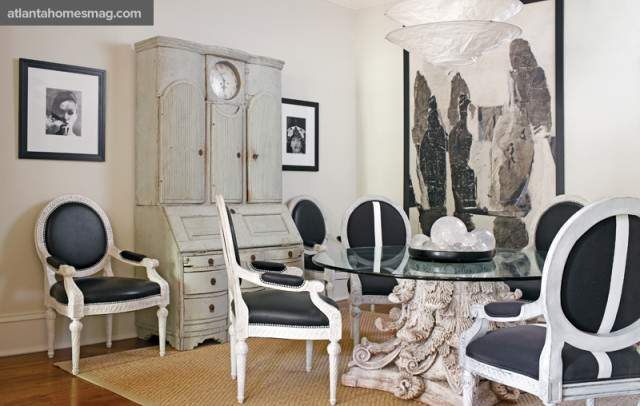 A glass-topped Corinthian column creates a one-of-a-kind dining table, surrounded by custom Louis XVI-style chairs. And the room boasts two equally grand focal points: a magnificent painting by Marie-Cecile Aptel and an 18th-century Swedish secretaire. “The secretaire used to be in my bedroom,” says Williams. “Who ever thought it would translate so well to this room?” Painting, Tew Galleries. Secretaire, Jacqueline Adams Antiques. Corinthian column, A. Tyner Antiques.