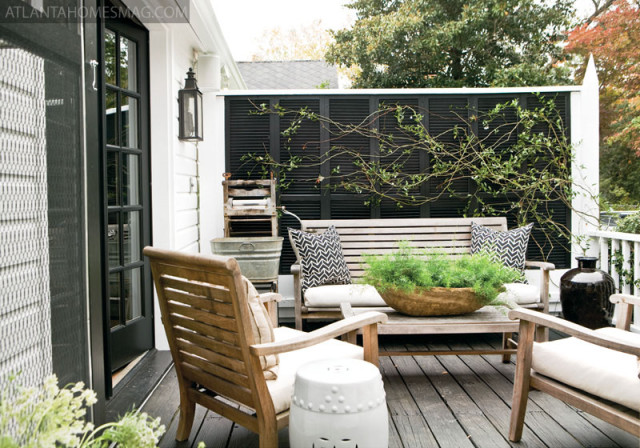 At the back of the Madison house, where there once stood only a window, Stanton and Greco added French doors, now leading to a welcoming deck. This helped to visually expand the living spaces and, in the process, created a fabulous spot to visit with friends. The landscaping is the handiwork of designers Brooks Garcia, past, and Tripp Pickles, present.