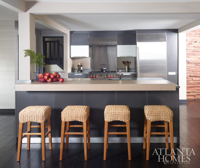 “We customized our Poggenpohl collection cabinetry to suit the client’s request for bold appliances and dark colors.” –John Coulter