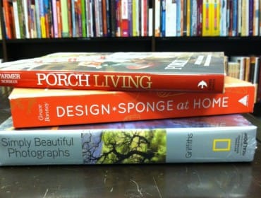 Stack of three books: 'Porch Living' by Norman Farmer, 'Design*Sponge at Home' by Grace Bonney, and 'Simply Beautiful Photographs' by Griffiths.