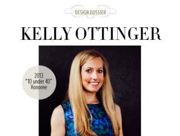 Kelly Ottinger, 2013 "10 under 40" Honoree, wearing a blue and green floral dress against a dark background.