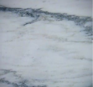Close-up of white marble with gray veining, named Montclair Marmi.