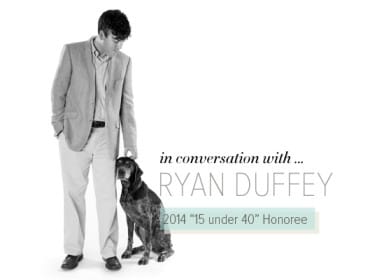 Man in a suit jacket and light-colored pants stands next to a dog, with text "in conversation with ... RYAN DUFFEY 2014 '15 under 40' Honoree"