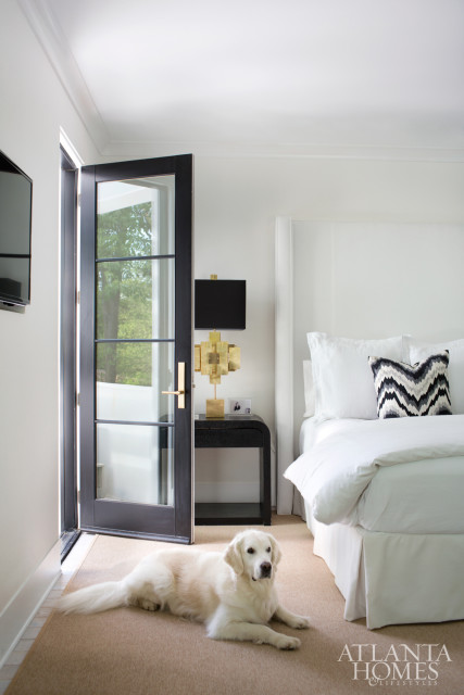 A balcony off the master bedroom overlooks the canopied neighborhood.