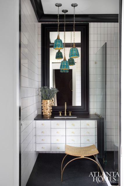 After scoring an amazing set of vintage turquoise pendants for Madison’s bathroom, Lee was inspired to carry this color throughout the main level of the