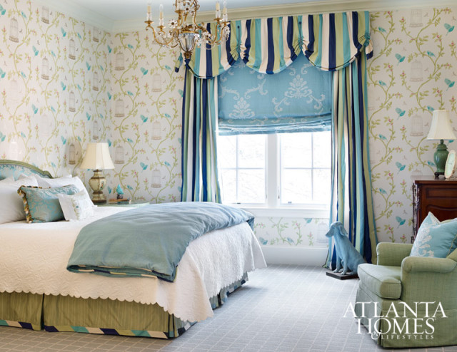 The guest room bedding and window treatments were retained, with the addition of a bright roman shade for privacy. The star of the room is now the fresh Nina Campbell wallpaper, which ties everything together.