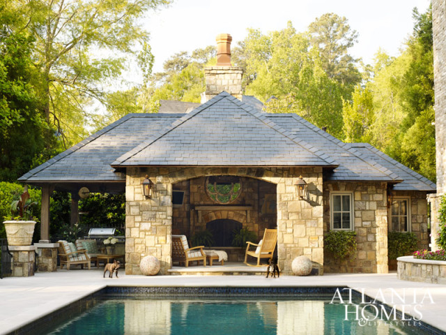 “The pool and outdoor living spaces are part of the evolution of this home and were added later,” says Weaks. “The Hillses and their large family love to be outdoors when possible, so these areas are used all the time.” Rick Hatch of Harrison Design designed the pool and pool house.