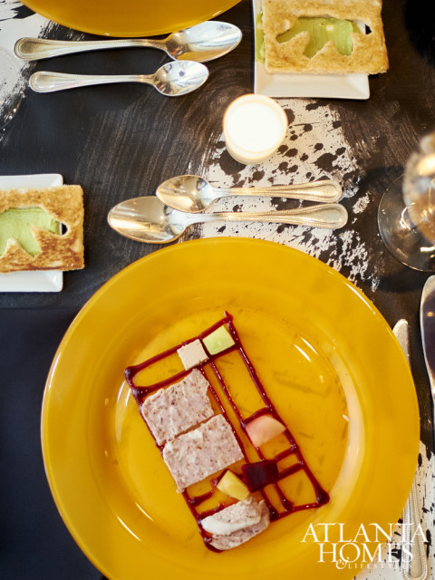 A Mondrian-esque terrine pops against Boomershine’s handpainted tablecloths.