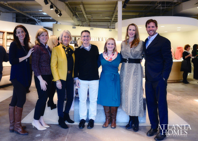 Group of six people posing for a photo in a retail or showroom setting. The Atlanta Homes & Lifestyles logo is visible in the lower right corner.