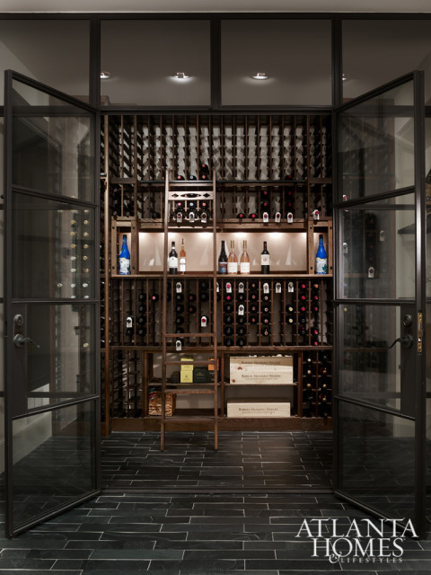 Even the wine cellar was treated to meticulous detailing, from steel-framed windows to moody tile.