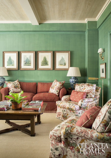 Decorative paint in a green linen finish adds a contemporary element to the family room, where a Cowtan & Tout chintz injects a traditional feel.