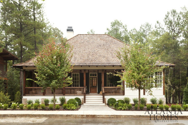 Serenbe’s verdant landscape informed the earthy, organic scheme of this front porch, designed by the in-house design team at B.D. Jeffries.